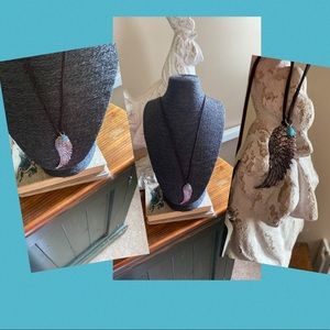 Awesome eagle’s wing with a turquoise bobble necklace!